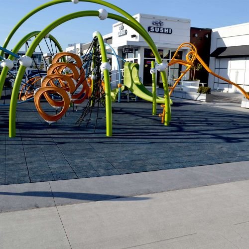 black playground tiles jungle gym install