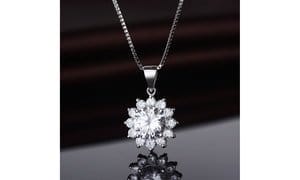 18 Karat White Gold Sunburst Pendant necklace with crystals from Swarovski