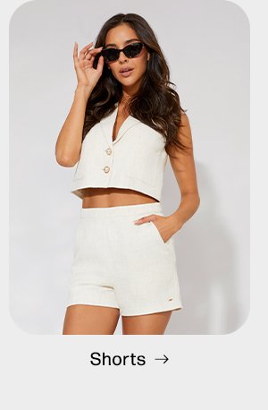 shop shorts for women featuring high-rise white shorts