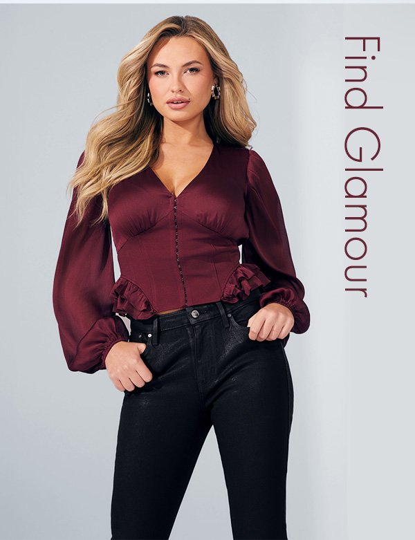 Woman in satin top and coated jeans. Check out what’s new on sale
