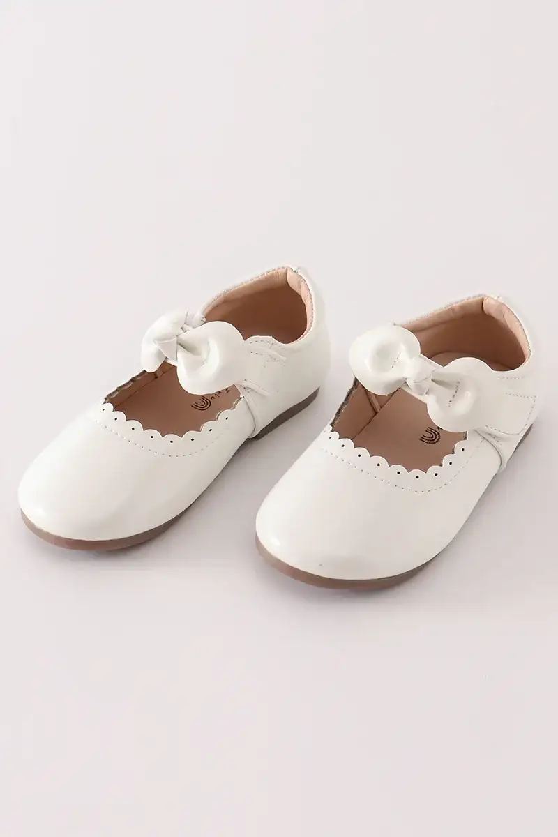 Image of White bow mary jane shoes