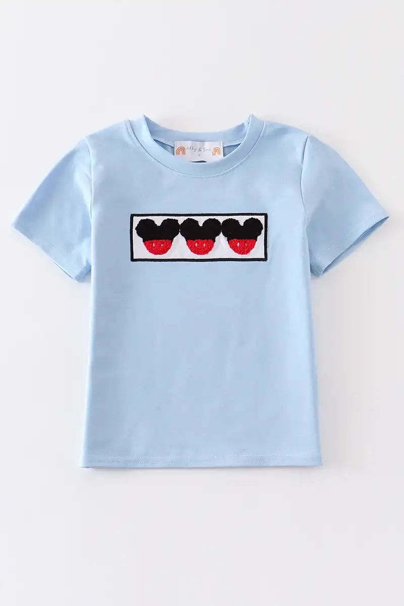 Image of Blue character french knot boy top