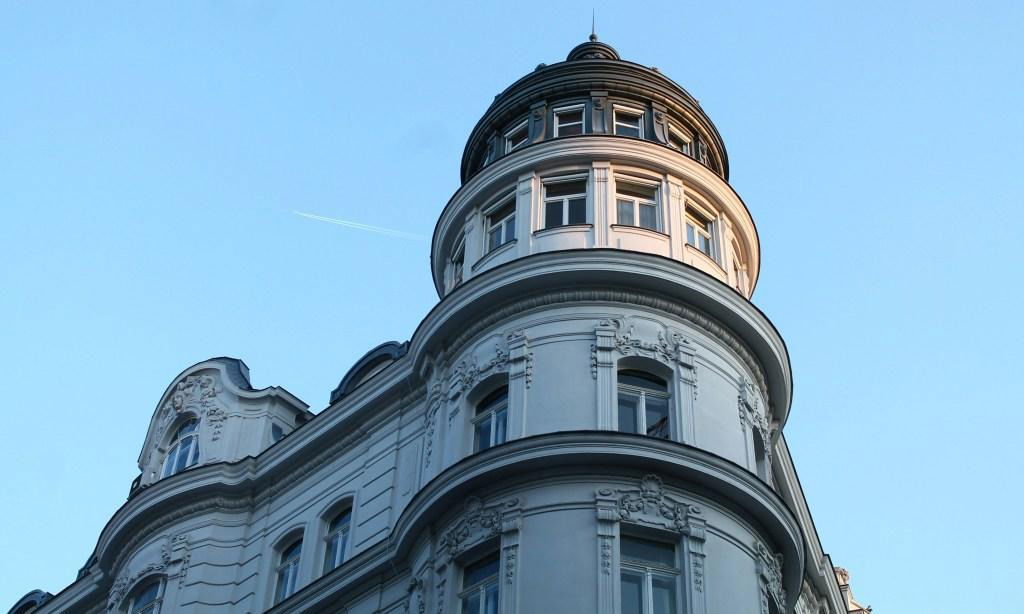 Plane flying above a building in Vienna