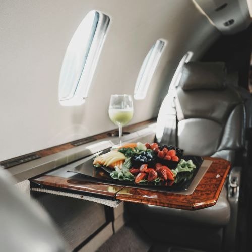 A fancy meal served in business class