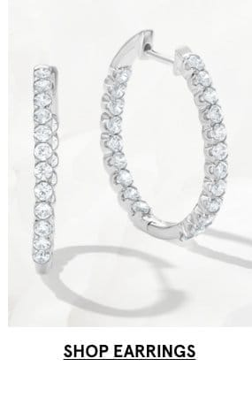 Image of diamond hoop earrings. Click SHOP EARRINGS >