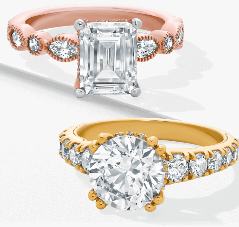 two rings with diamonds, one rose gold and one gold.