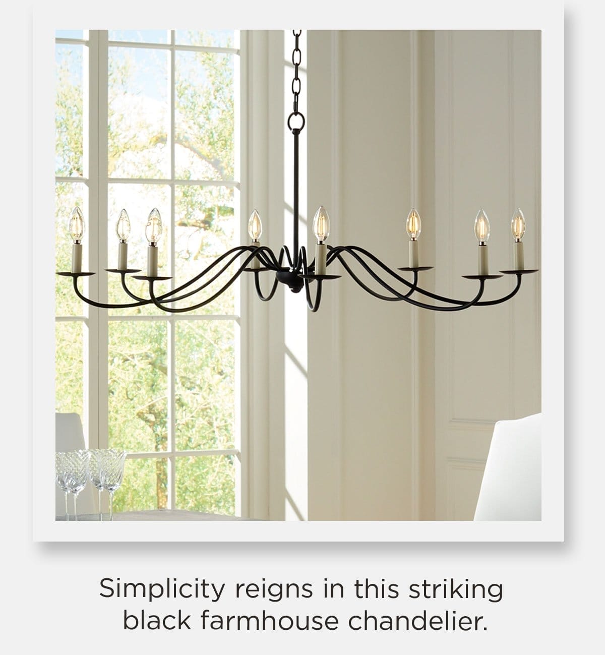 Simplicity reigns in this striking black farmhouse chandelier.