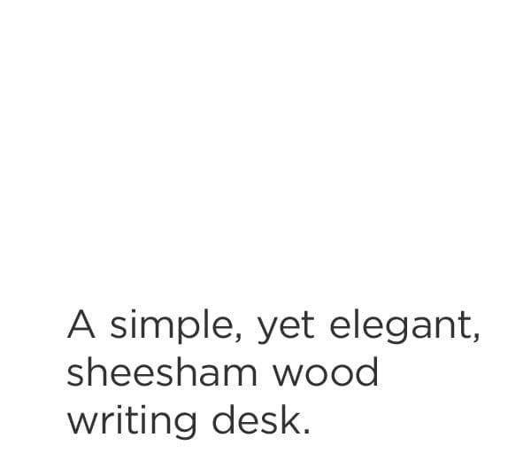 A simple, yet elegant, sheesham wood writing desk.