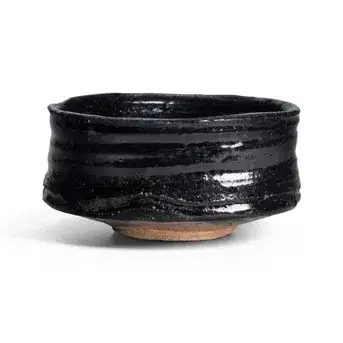 A Mino Ware Tea Bowl, Black Seto Type<br>19th/20th century