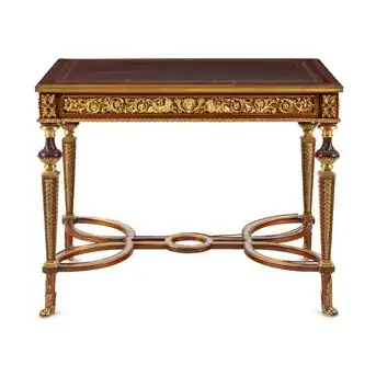 A Louis XVI Style Gilt Bronze Mounted Mahogany Writing Table