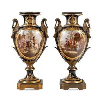 A Pair of Large Gilt Bronze Mounted Sèvres Style Porcelain Urns