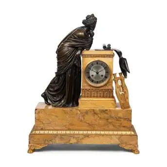 A Large Empire Gilt and Patinated Bronze and Marble Figural Clock