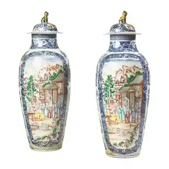 A pair of large and finely painted Chinese Export porcelain Famille Rose covered vases