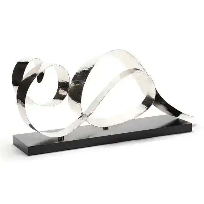 A Contemporary Abstract Hammered Aluminum Sculpture