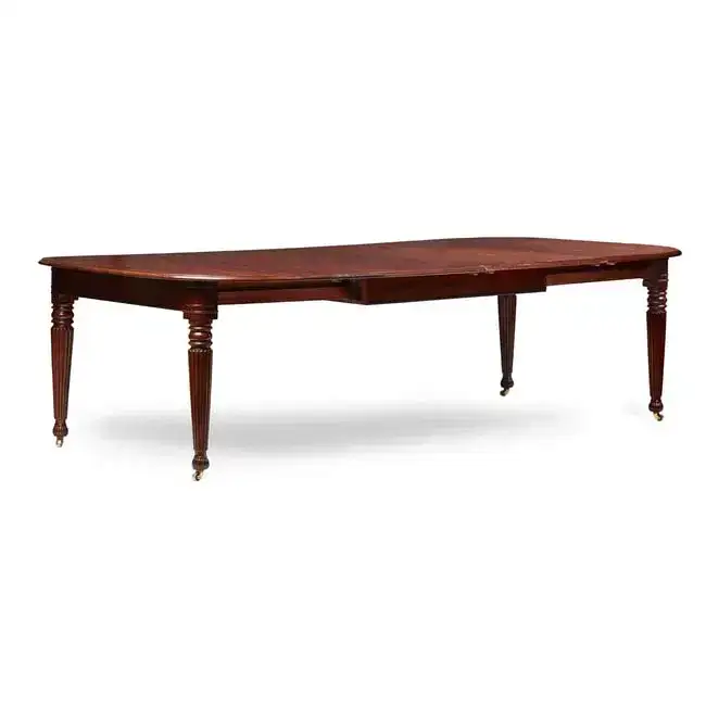 REGENCY MAHOGANY EXTENDING DINING TABLE, IN THE MANNER OF GILLOWS