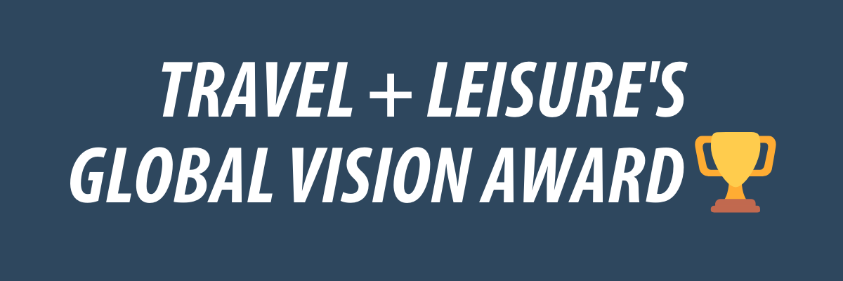 White text over a navy background, "Travel + Leisure's Global Vision Award🏆"