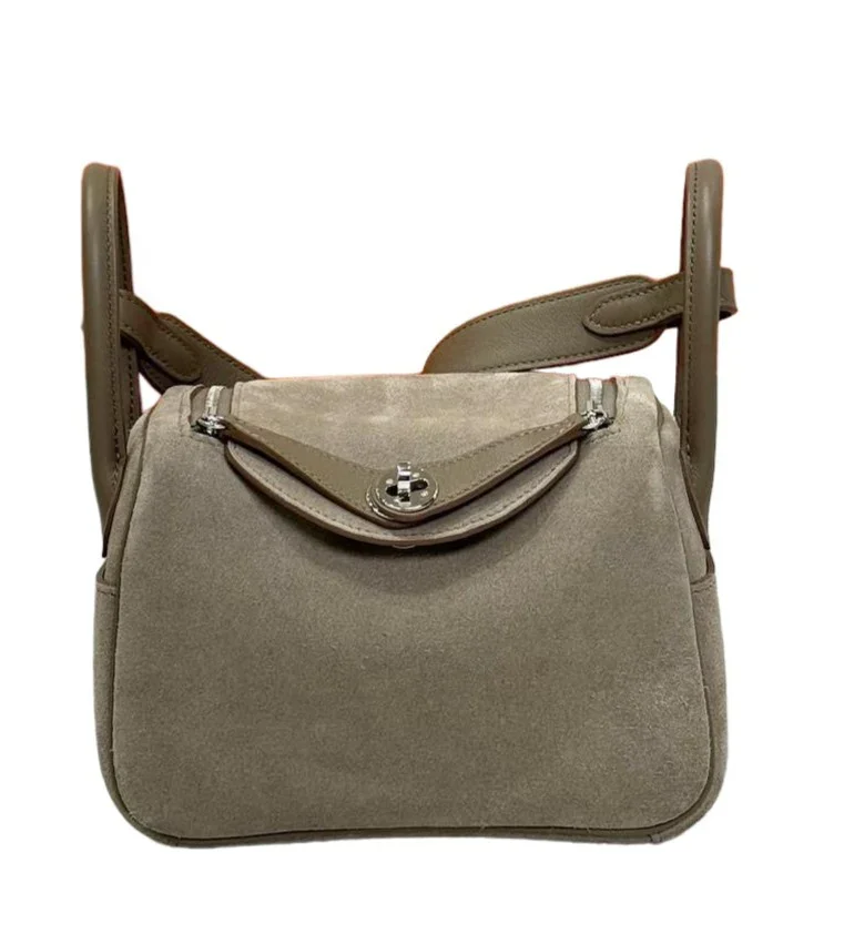 Image of HERMÈS Mini Lindy shoulder bag in Etoupe Doblis Suede leather and Swift leather with Palladium hardware