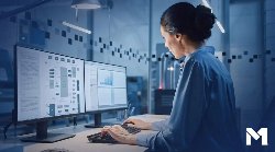 Woman typing on a computer