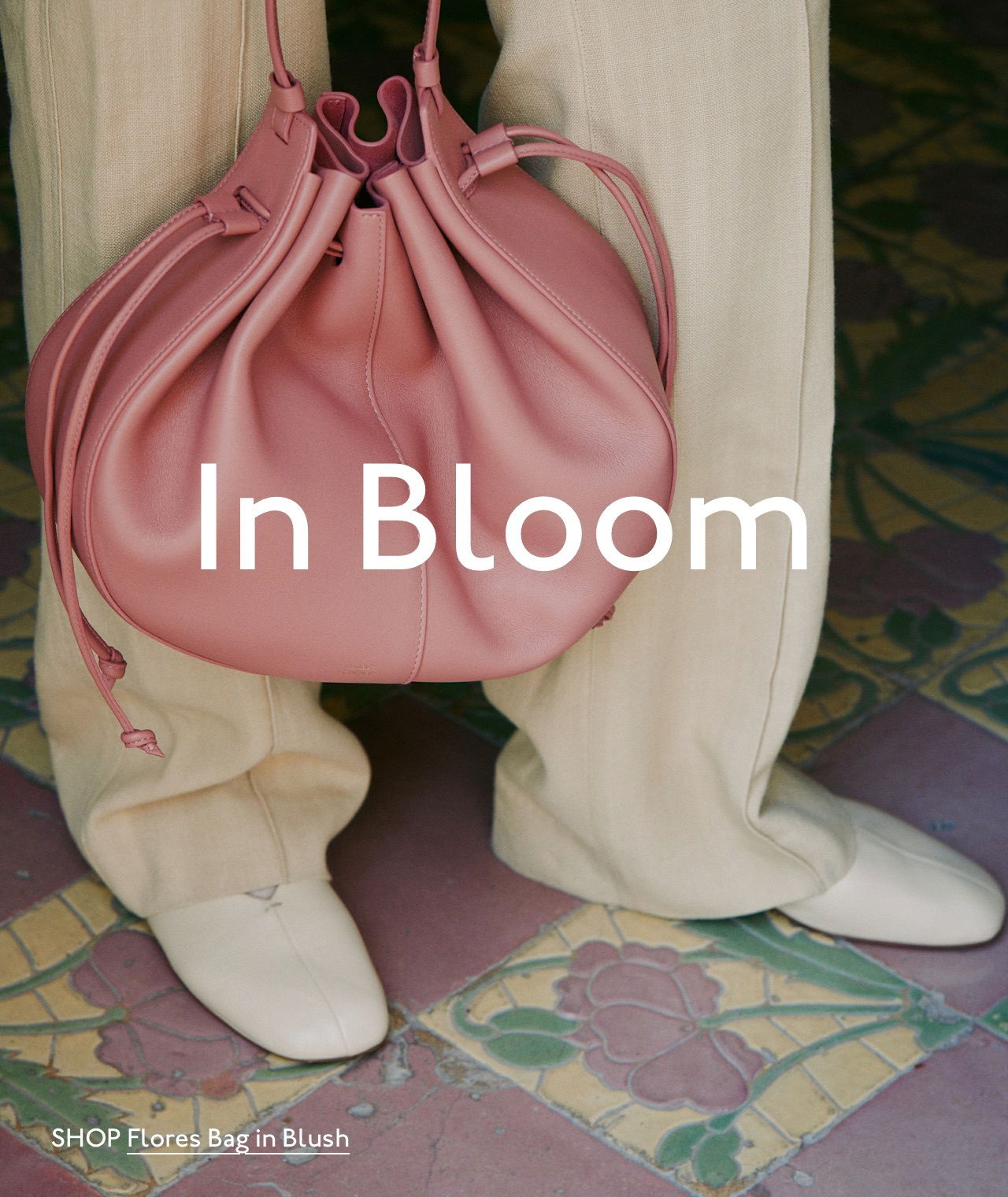 In Bloom. Introducing our new bag, the Flores in biscotto, black and blush. Shop now.