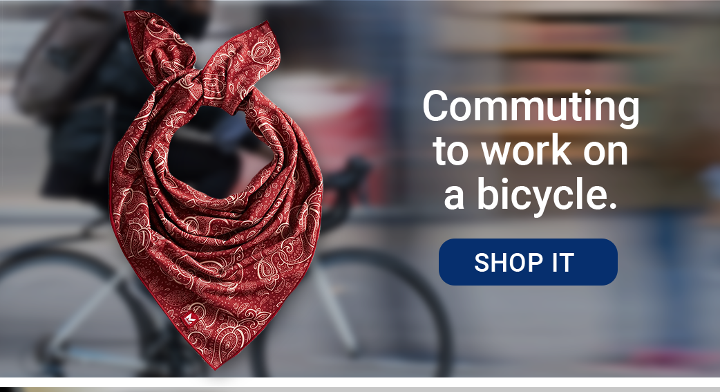 Commuting to work on a bicycle. [RED ON A CITY BICYCLE [SHOP IT]