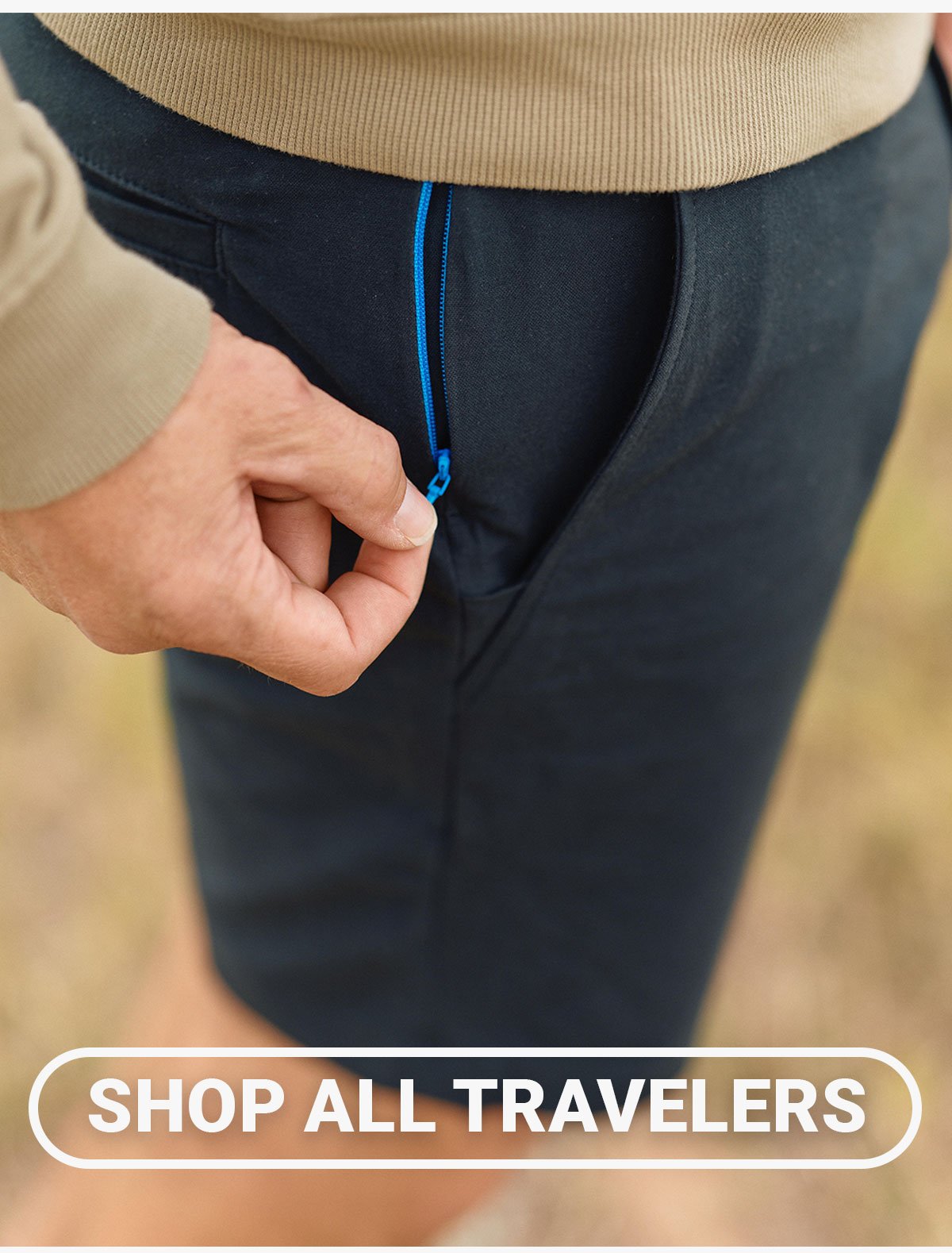 Button to shop all travelers. Image of model zipping open travel shorts passport pocket.