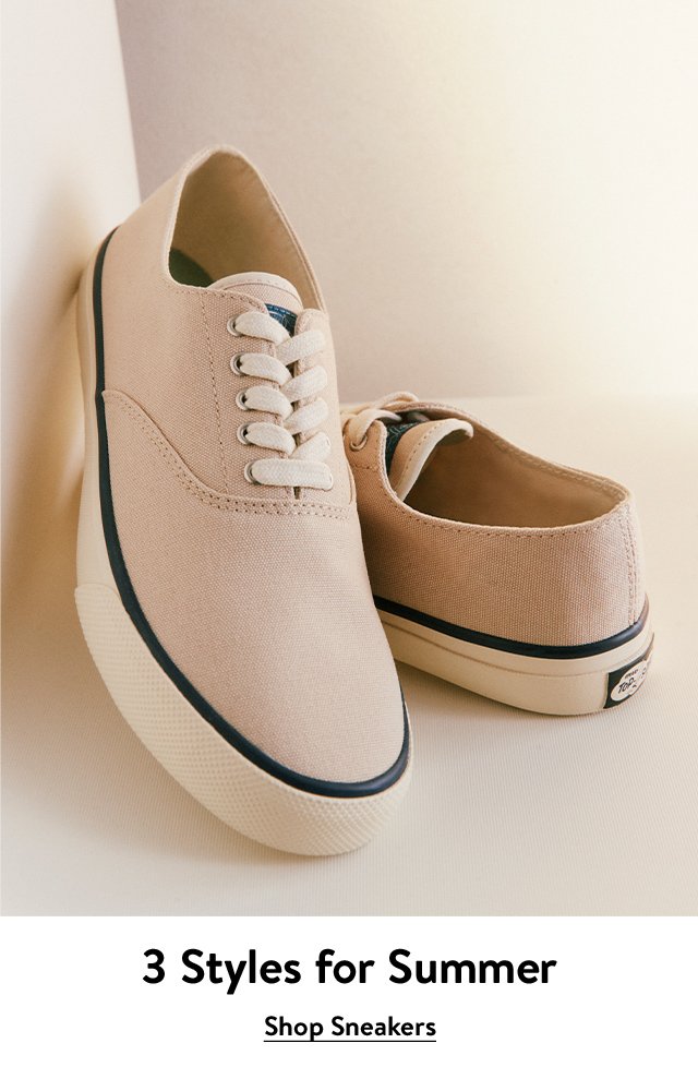 Tan canvas sneakers.