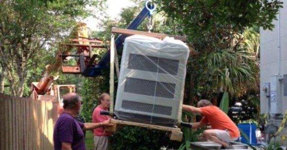 This homeowner is moving their new standby generator from the curb to a custom concrete pedestal at their home after Hurricane Katrina left them without power. Tight space and a heavy generator necessitated some heavy equipment and the help of friends. Note the lift straps attached to the pipes inserted into the generator lift holes. Photo provided by Cyril Laan