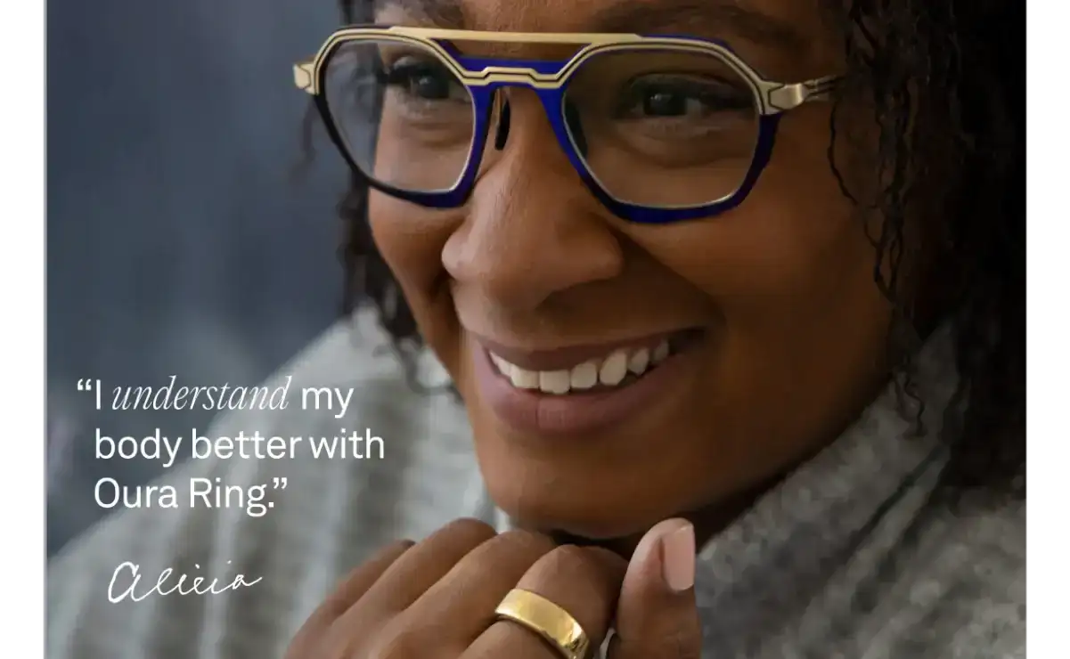 Woman Wearing Gold Oura Ring