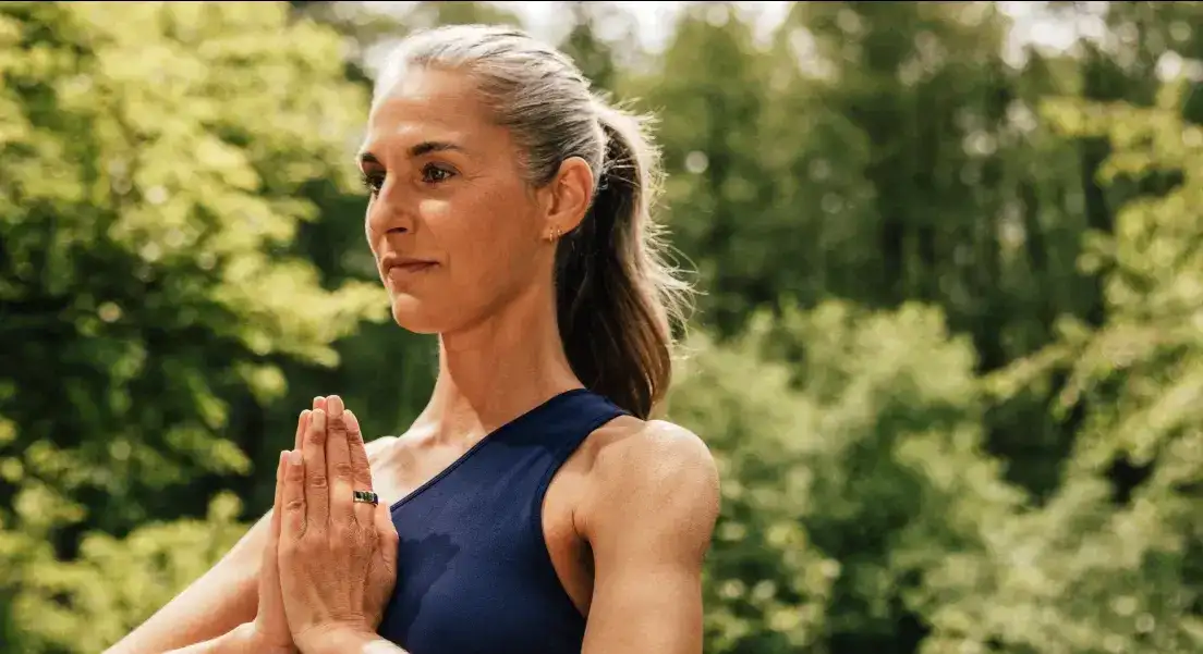 Person Wearing Oura Ring Doing Yoga