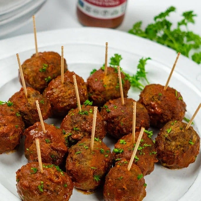 Meatballs on a plate with toothpicks