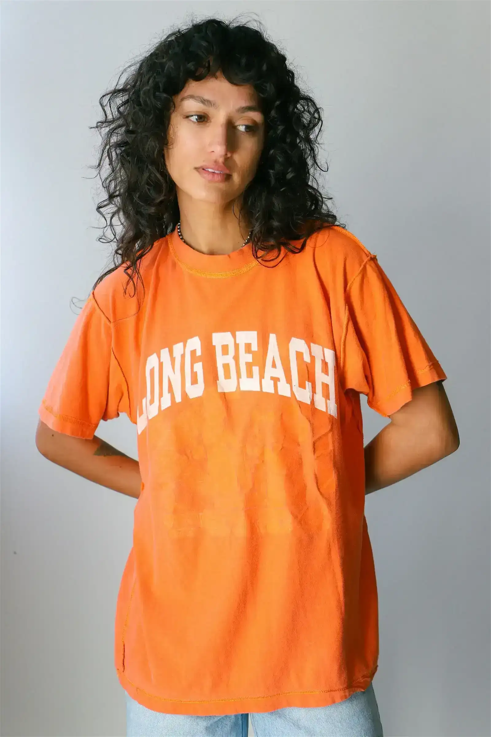 Image of Best Regards X Prism <br> Orange Varsity Tee 003