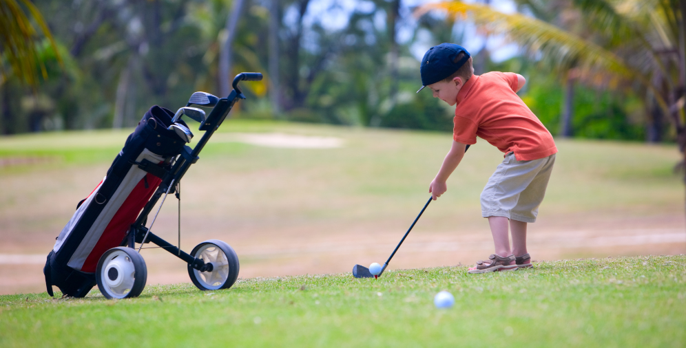 child playing golf