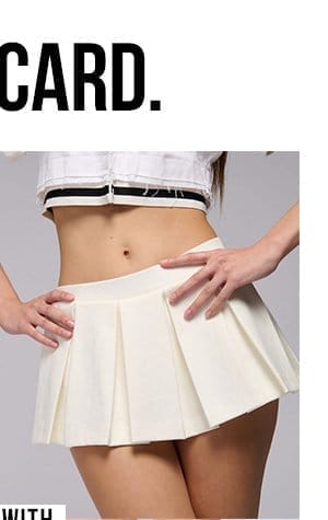 YOURS TRULY MICRO MINI SKORT IN WHITE