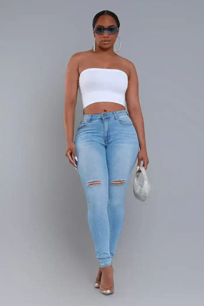 Image of Steal The Show Hourglass High Rise Ripped Stretchy Jeans - Light Wash