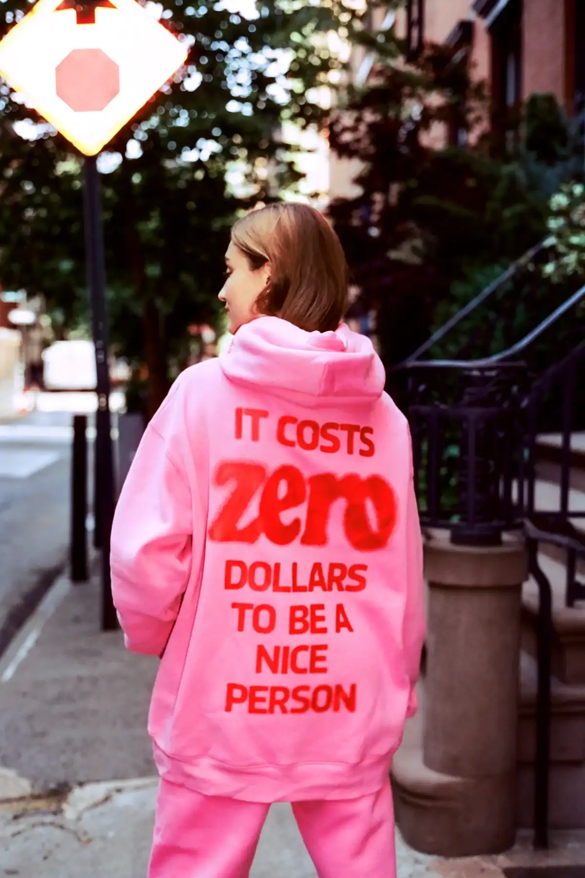 Image of It Costs \\$0.00 To Be A Nice Person Pink Hoodie