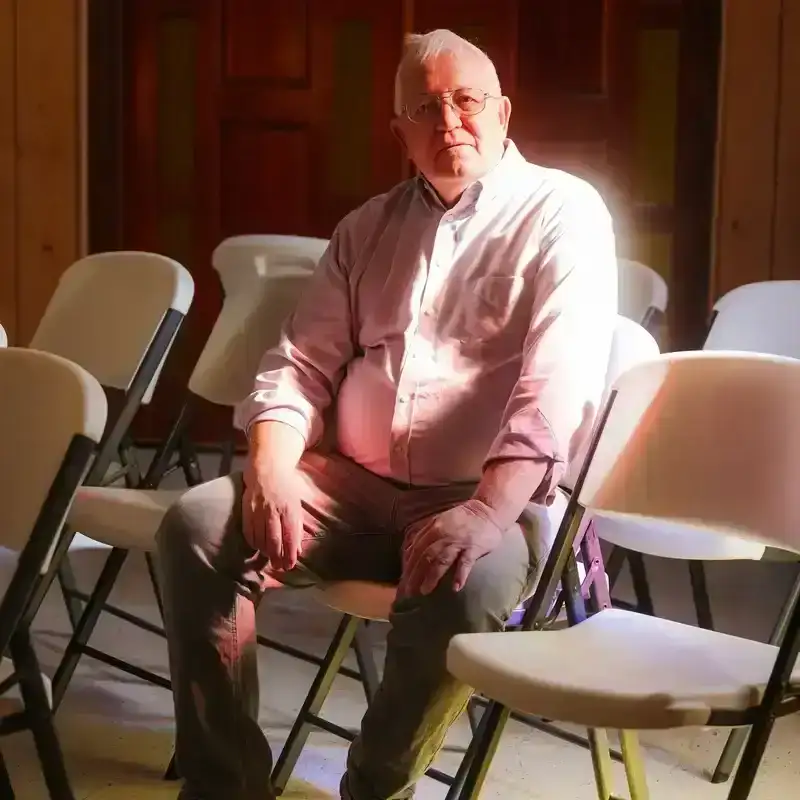 Ruben Garcia, 75, director of Annunciation House, poses for a portrait at Casa Papa Francisco, one of the Annunciation House’s hospitality sites.