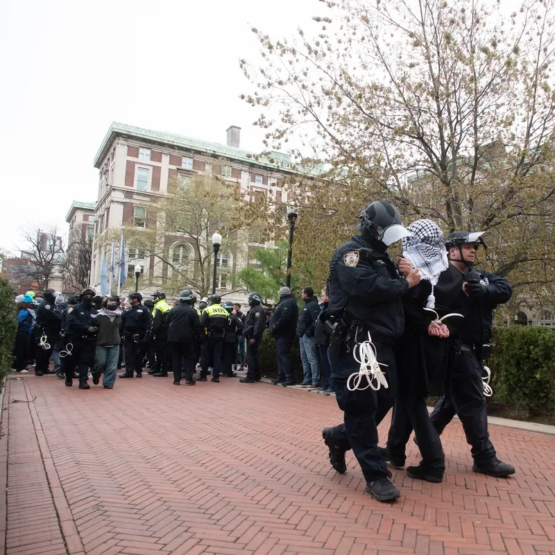 NYPD arresting a student at Columbia University in April 2024. 