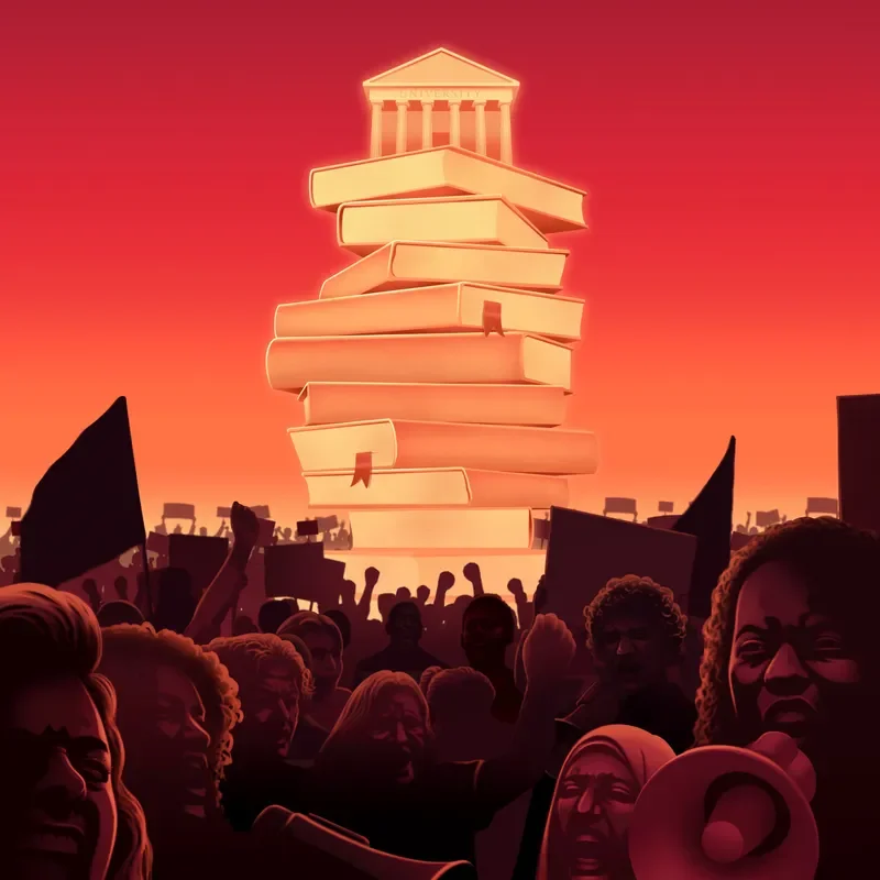 Crowd protesting against the backdrop of a tower made of books