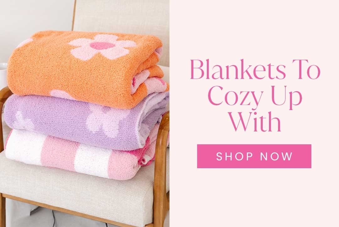 SHOP BLANKETS TO COZY UP WITH