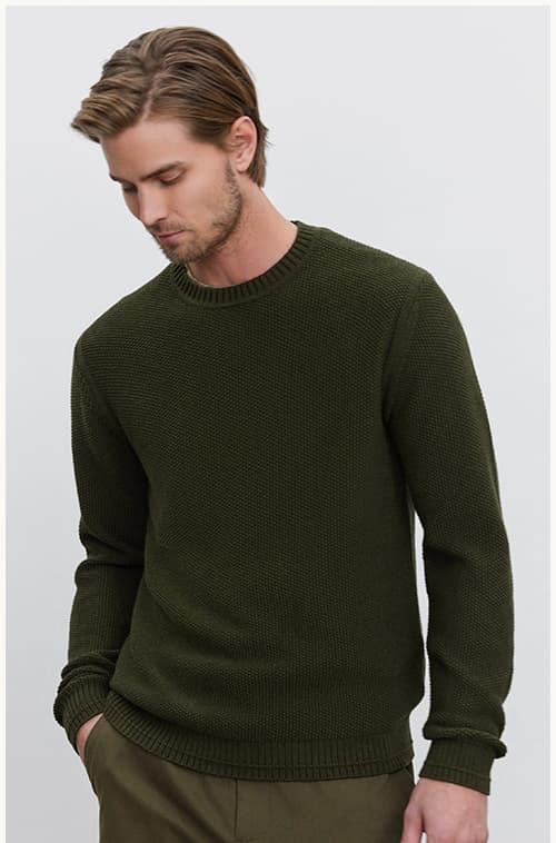 Model wearing the Marco Sweater in Olive