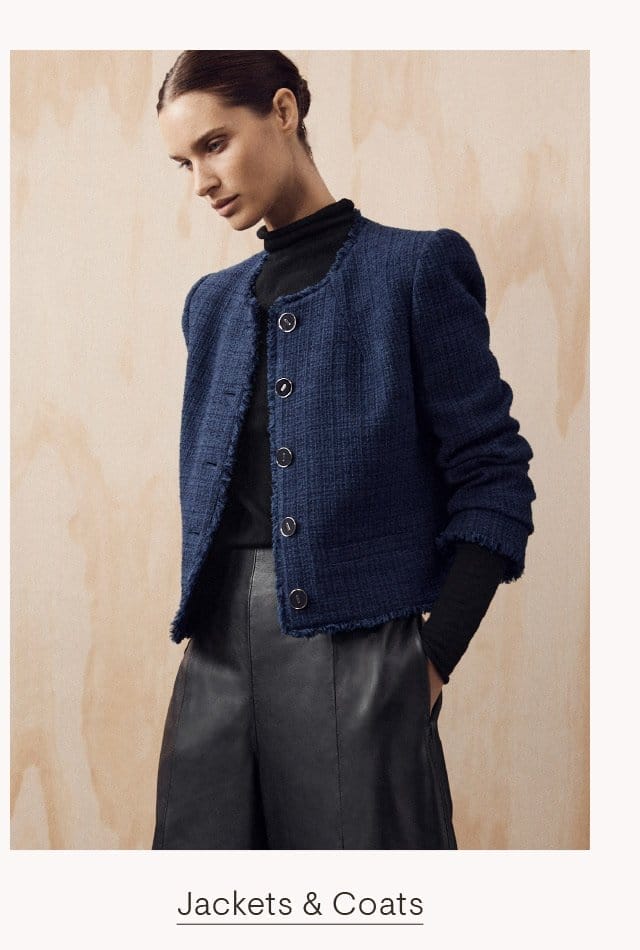 The model is wearing Modern Tweed Jacket