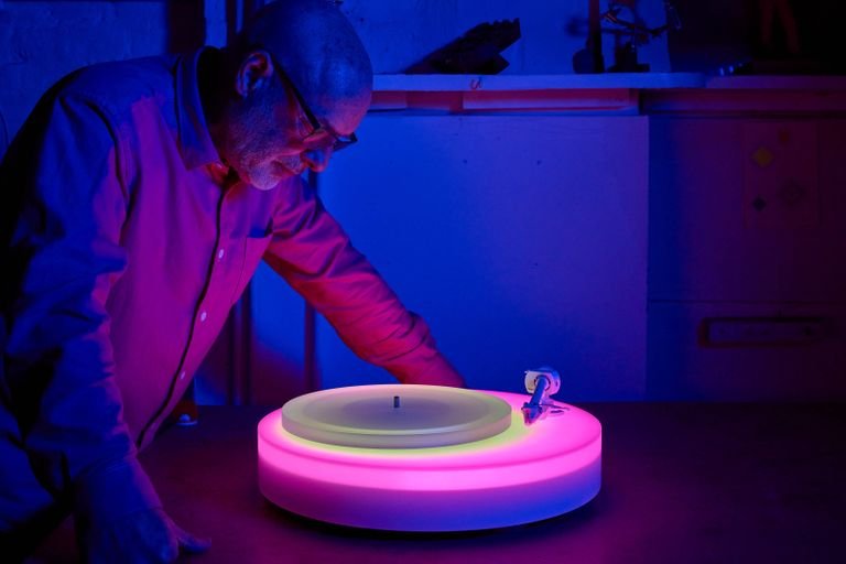 Brian Eno with illuminated turntable