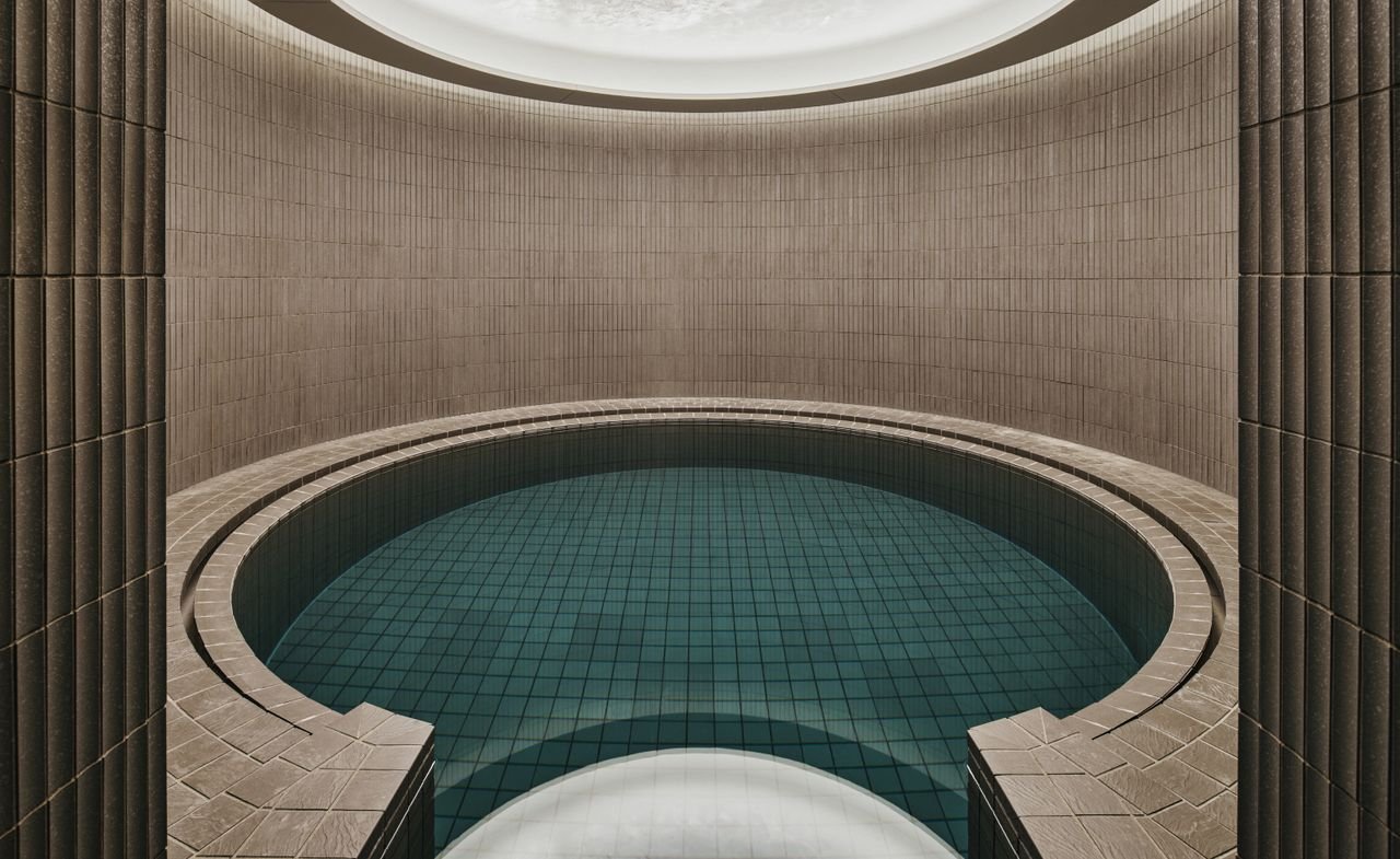 Circular pool in minimal spa