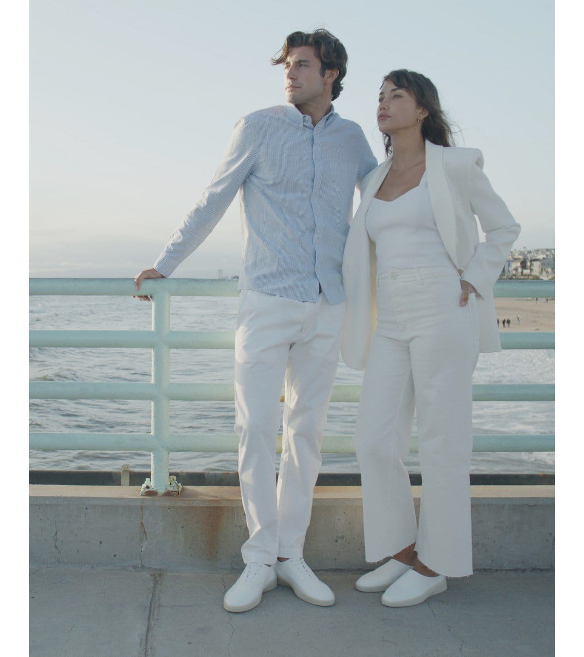 Wolf & Shepherd Cruise couple on pier with ocean