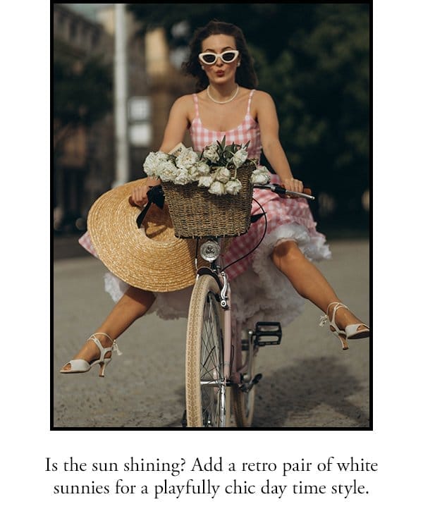 Is the sun shininh? Add a retro pair of white sunnies for a playfully chic day time style.