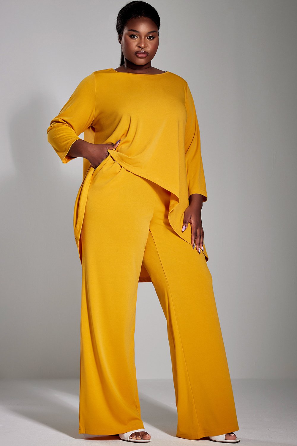 Xpluswear Design Plus Size Casual Pant Set Yellow Round Neck Short Sleeve Irregular Two Piece Pant Set