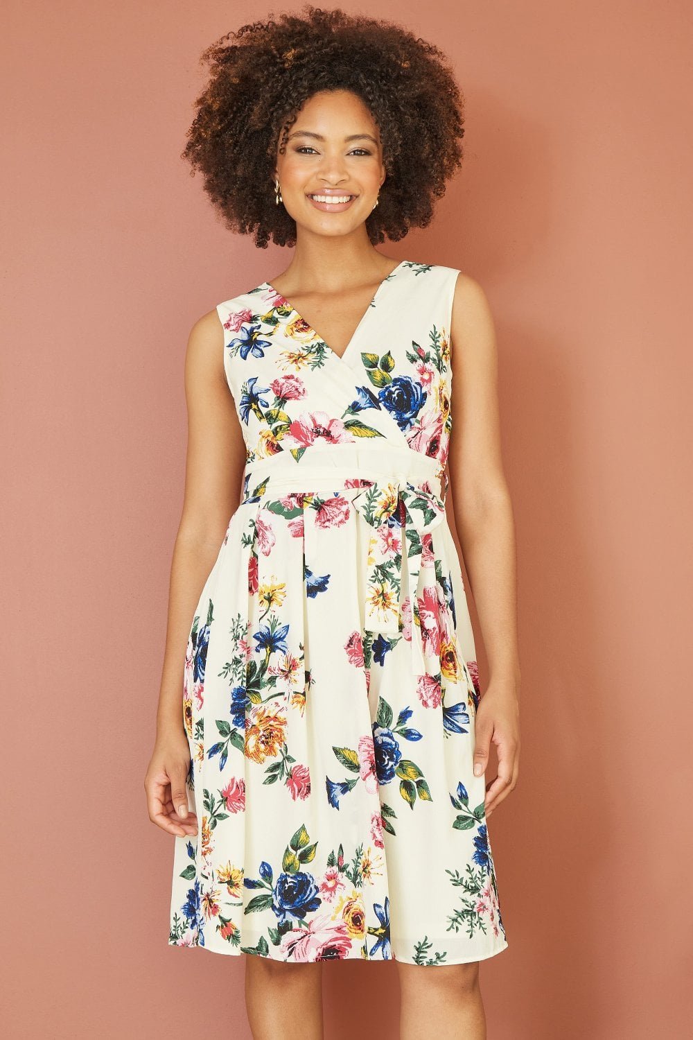 Image of Mela Ivory Floral Wrap Over Midi Skater Dress