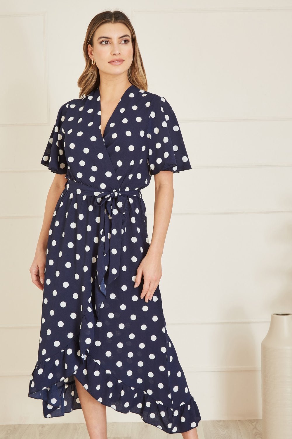 Image of Mela Navy Spot Print Wrap Midi Dress With Frill Detail